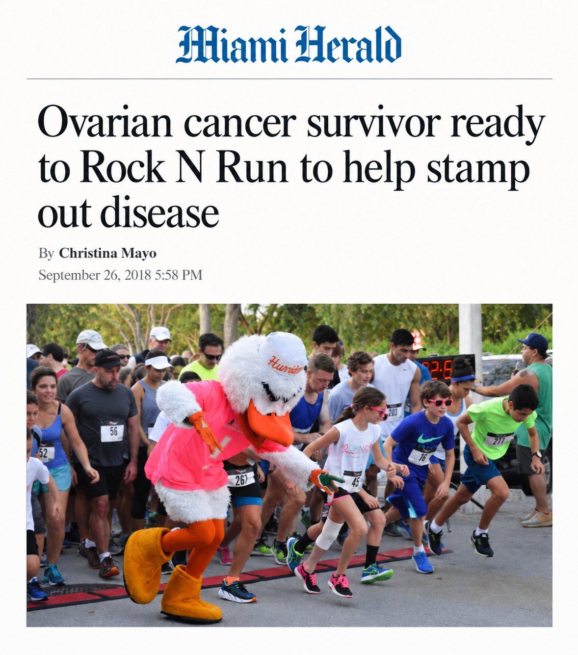 Miami Herald article headlined Ovarian cancer survivor ready to Rock N Run to help stamp out disease, by Christina Mayo, September 26, 2018, with a photo of runners at the start line beside a mascot